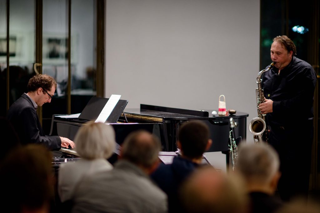 jazz band plays the concert in front of the audience at the dinner events